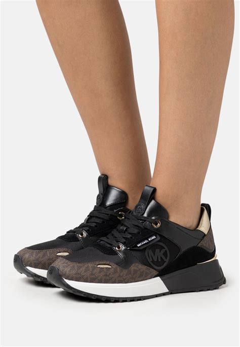 michael michael kors sneaker low black|michael kors black designer sneakers.